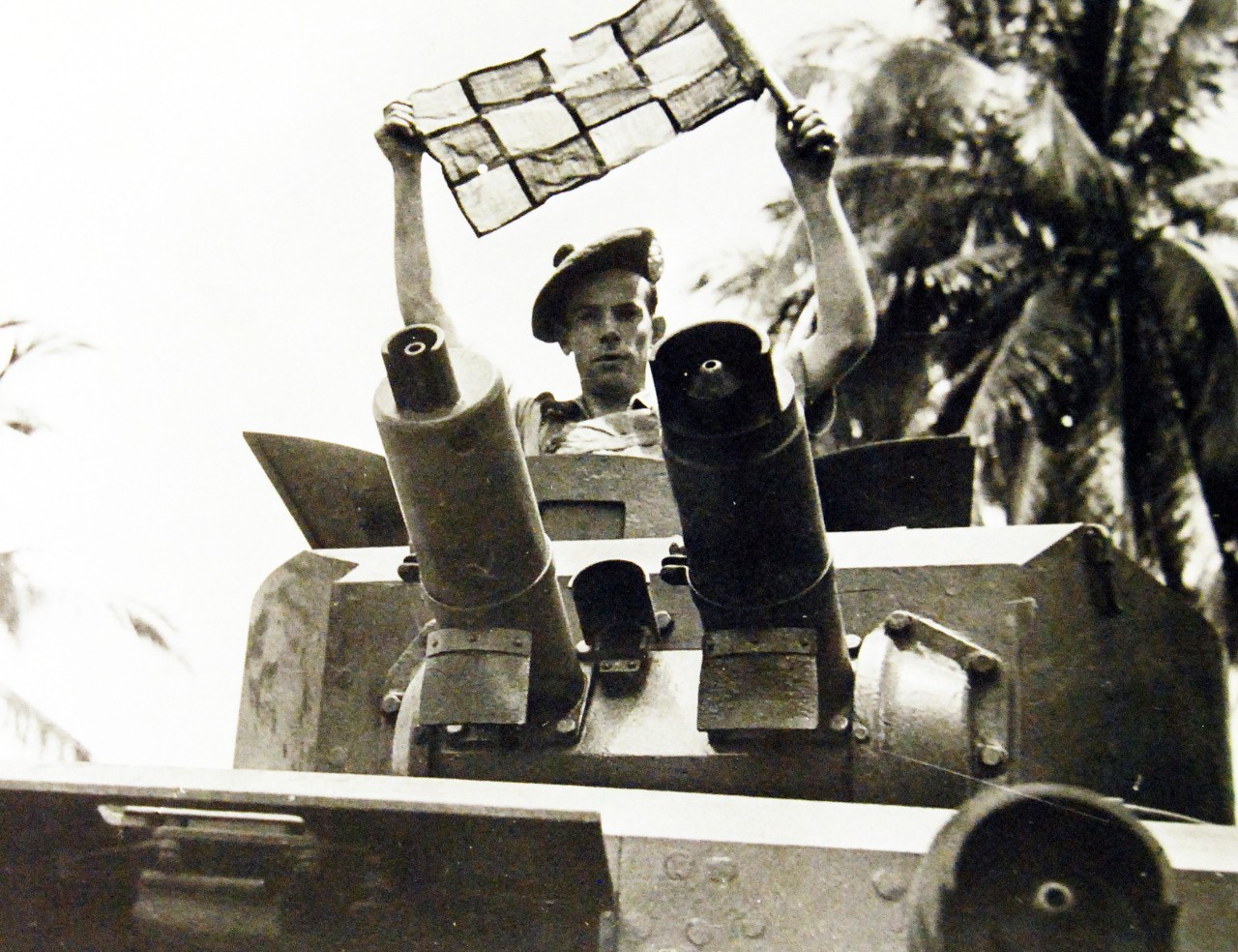 Lot 11612-8:  Malayan Campaign, December 1941-January 1942.  Argylls and Sutherlanders in Malaya.  Constant practice in patrolling jungle roads, keeps members of this famous regiment in full fighting for their special job.  Photograph shows a member of a vehicle crew putting up a signal.  Office of War Information Photograph. Courtesy of the Library of Congress. (2016/01/22).