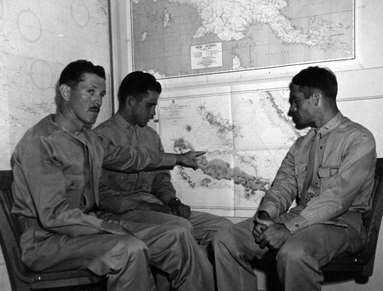 80-G-27199: Guadalcanal Campaign, August 1942 to February 1943.  A A Left to right: Lieutenant Colonel Richard C. Mangrum; Captain Marion E. Carl, and Major John L. Smith, USMC Aviators, who were interviewed concerning their action in the Guadalcanal area.  Lieutenant Colonel Mangrum was in command of a dive-bomber squadron.   Official U.S. Navy photograph, now in the collections of the National Archives.  (2016/12/06).