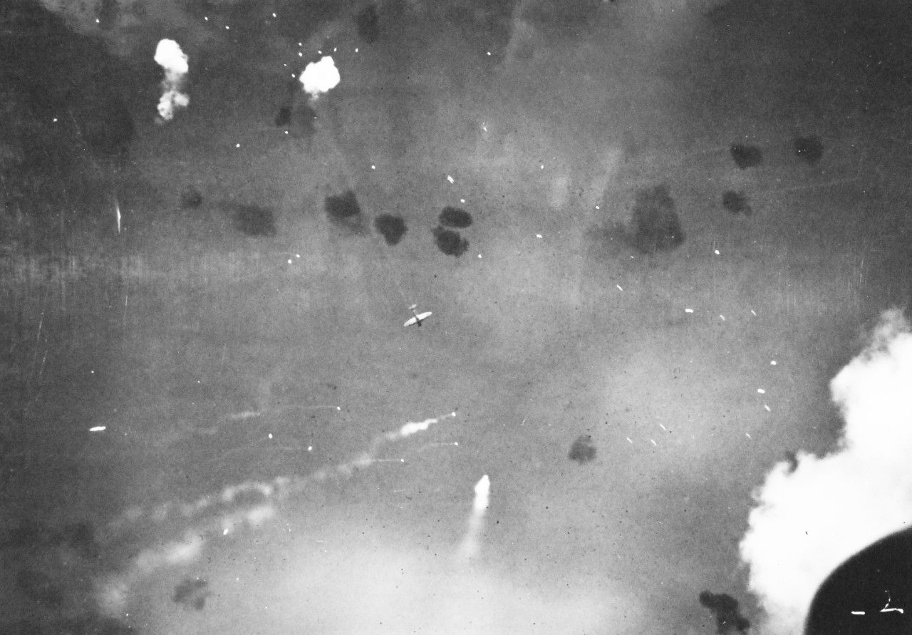 80-G-33934:  Battle of Santa Cruz Islands,  26 October 1942.     Sinking of USS Hornet (CV 8) by attacks from Japanese Aichi D3A “Val” dive bombers.  Photographed from USS Pensacola (CA 24).  U.S. Navy photograph, now in the collections of the National Archives.  (2015/11/17).
