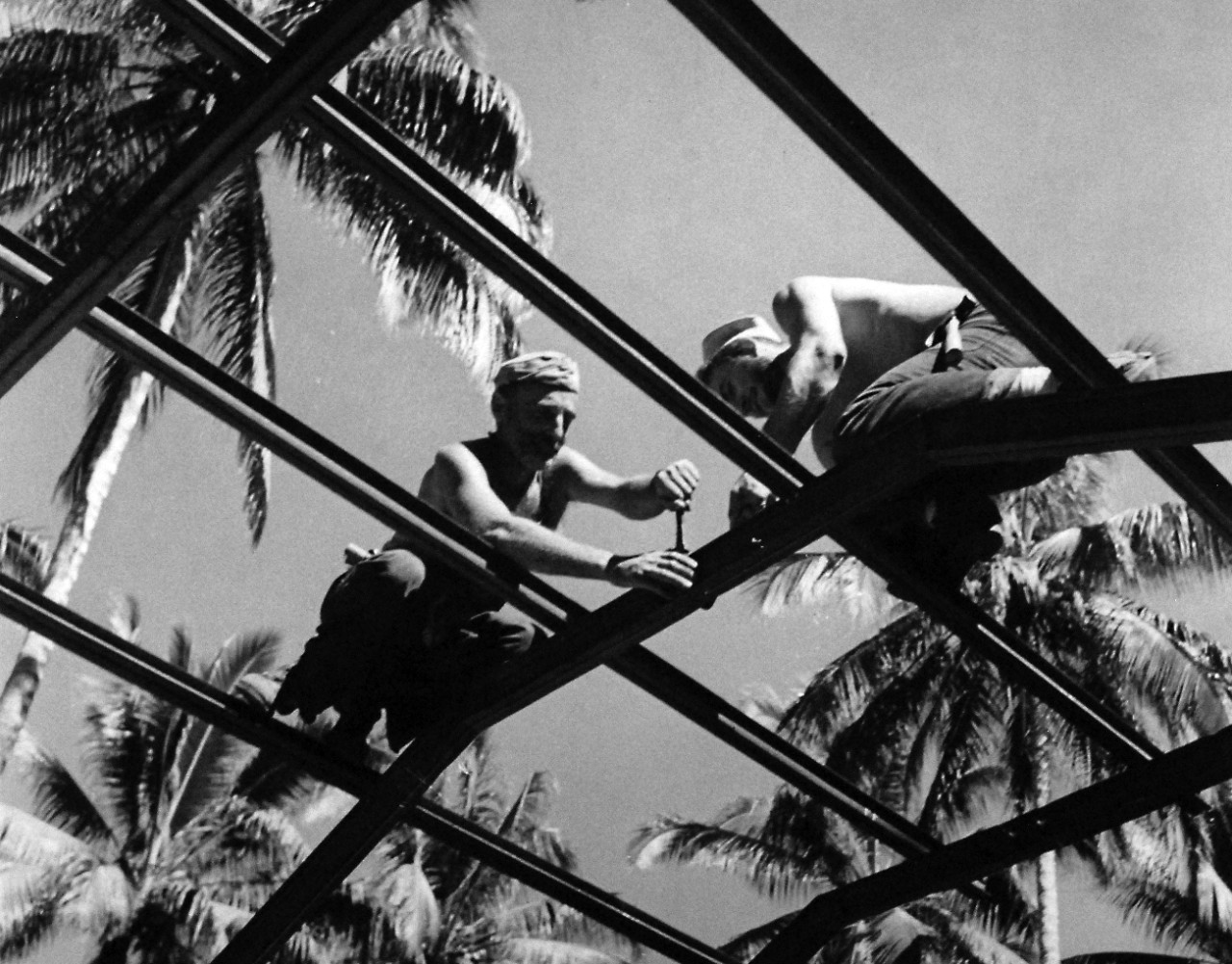 80-G-39217: Guadalcanal Campaign, August 1942-February 1943.  U.S. Navy Seabees constructing a Quonset Hut at Guadalcanal, January 30, 1943.    Official U.S. Navy photograph, now in the collections of the National Archives.  (2016/12/06).