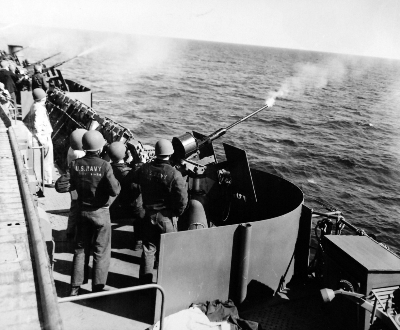 80-G-375578: USS Hoggatt Bay (CVE-75). Shown: 20MM guns firing onboard. Photograph received June 3, 1946. Official U.S. Navy Photograph, now in the collections of the National Archives.