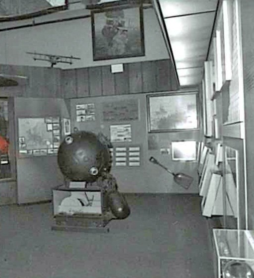 NMUSN-1646: World War I exhibit, late 1970s. Area shows a different view of the MK6 Mine. Image is from a positive film strip sheet and also has a grease-pencil mark in the left. National Museum of the U.S. Navy Photograph Collection.