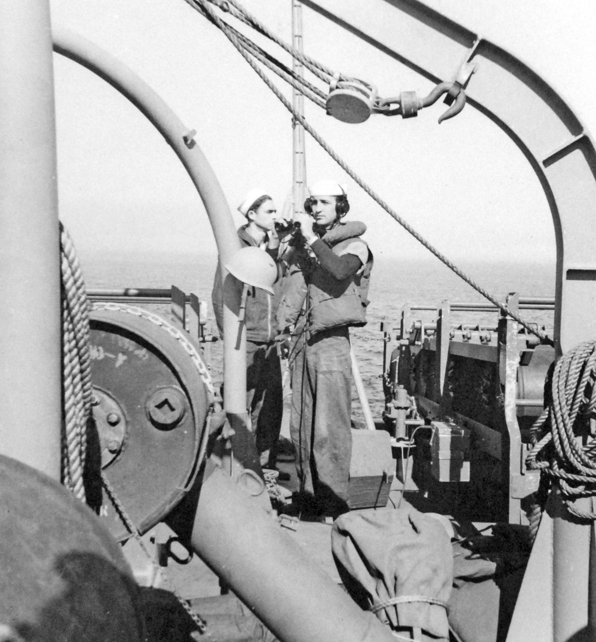 80-G-14939: Navigating USS PC-556. Depth charges onboard.