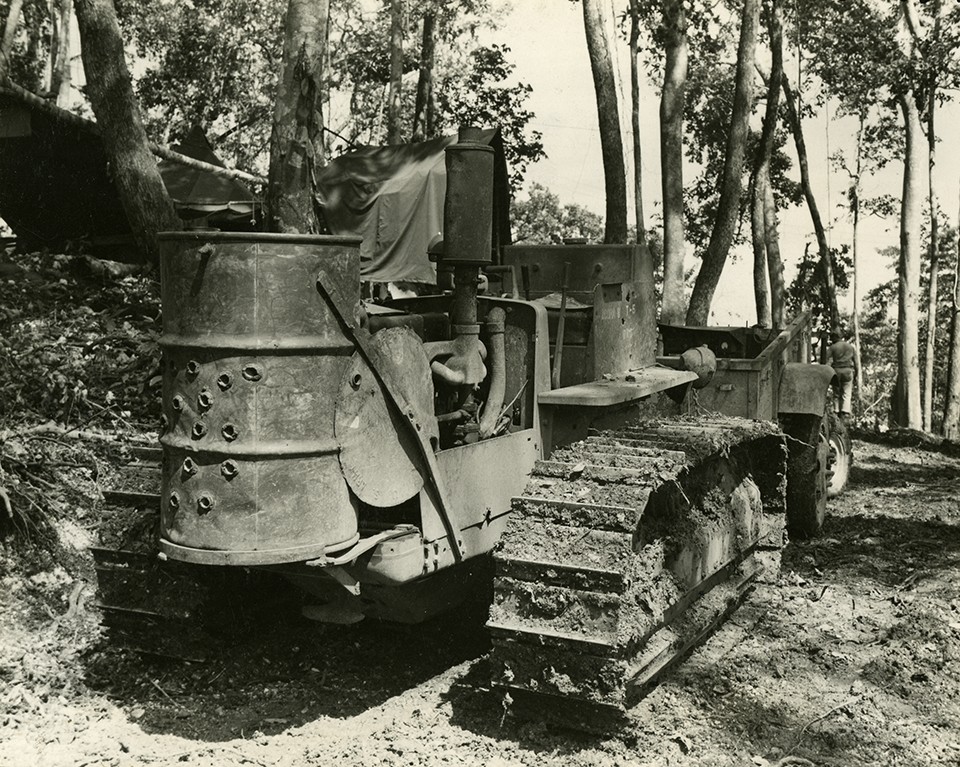 Photograph of bulldozer with improvised 55-gallon drum, Walsworth photo, WWII