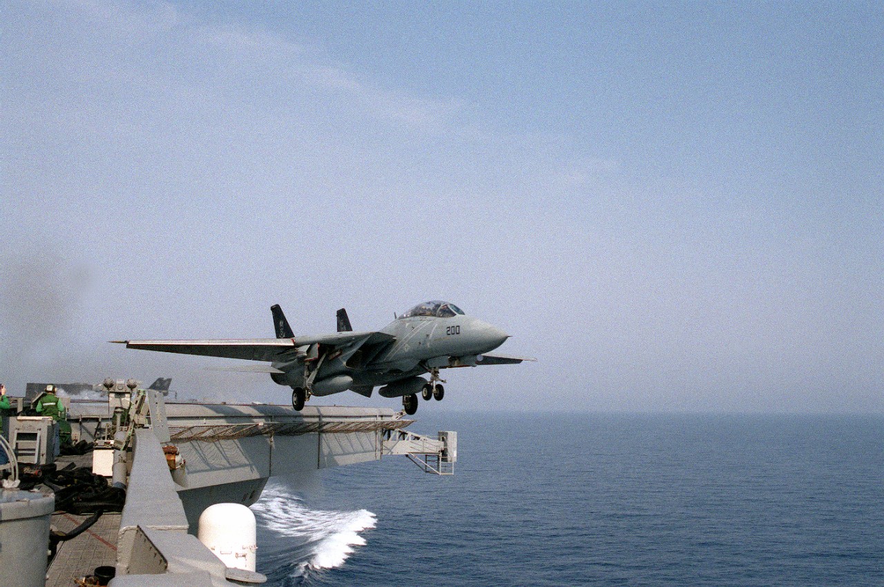 An aircraft launches off of a Navy carrier in the Adriatic Sea. 