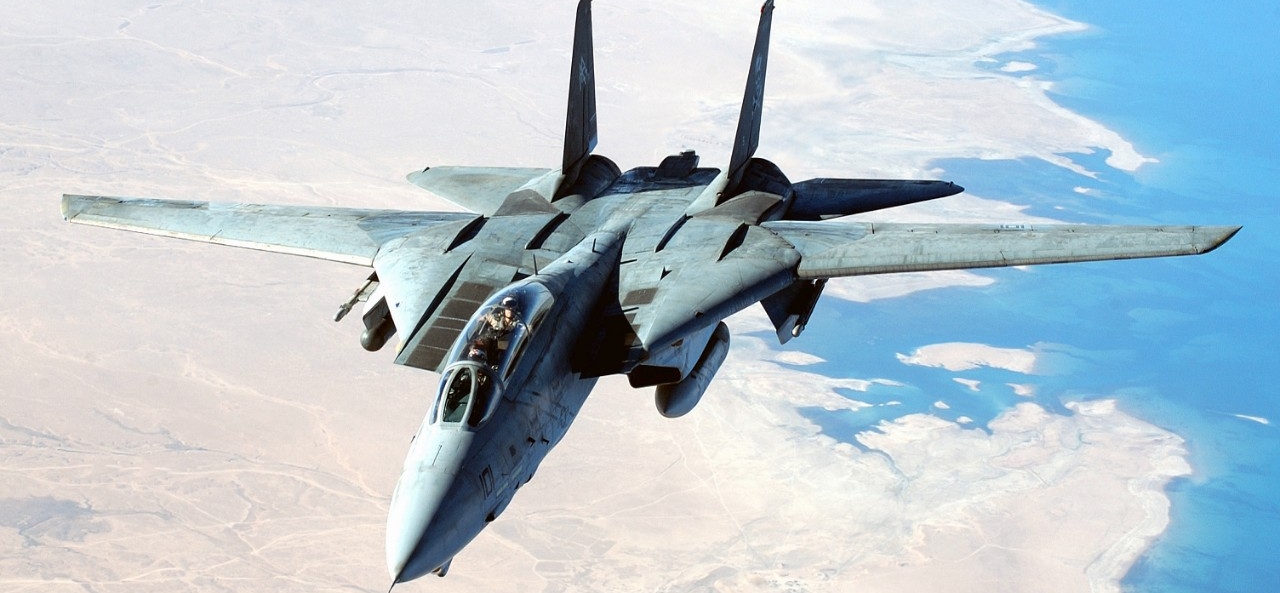 A U.S. Navy F-14D Tomcat aircraft flies a combat mission in support of Operation Iraqi Freedom, 14 August 2004. National Archives Identifier: 6660203.