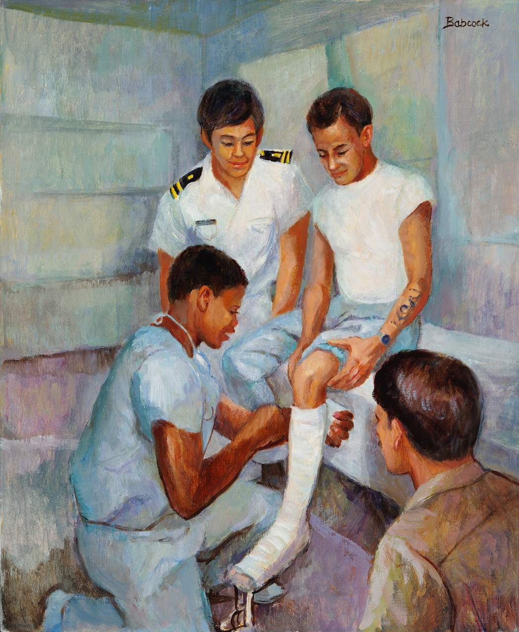 An African American nurse applies a cast to a sailors leg
