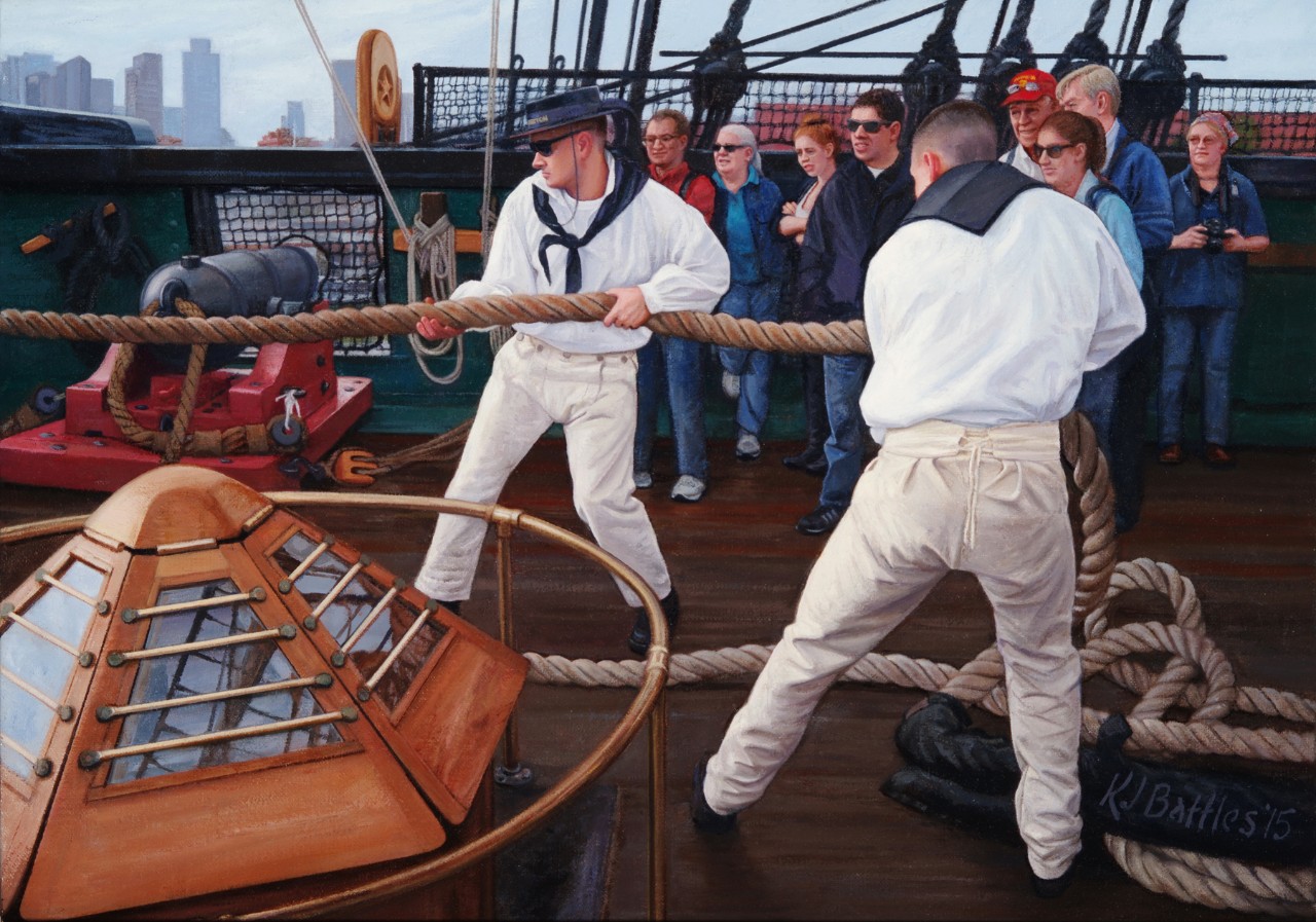 Two sailors in 19th century uniforms pull on a rope while people watch