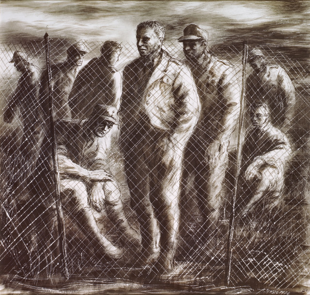 German prisoners behind barbed wire fence