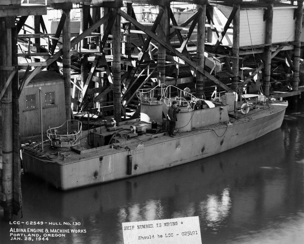 USS LCC-C25491 fitting out at the Albina Engine and Machine Works, Portland, Oregon, 28 January 1944.