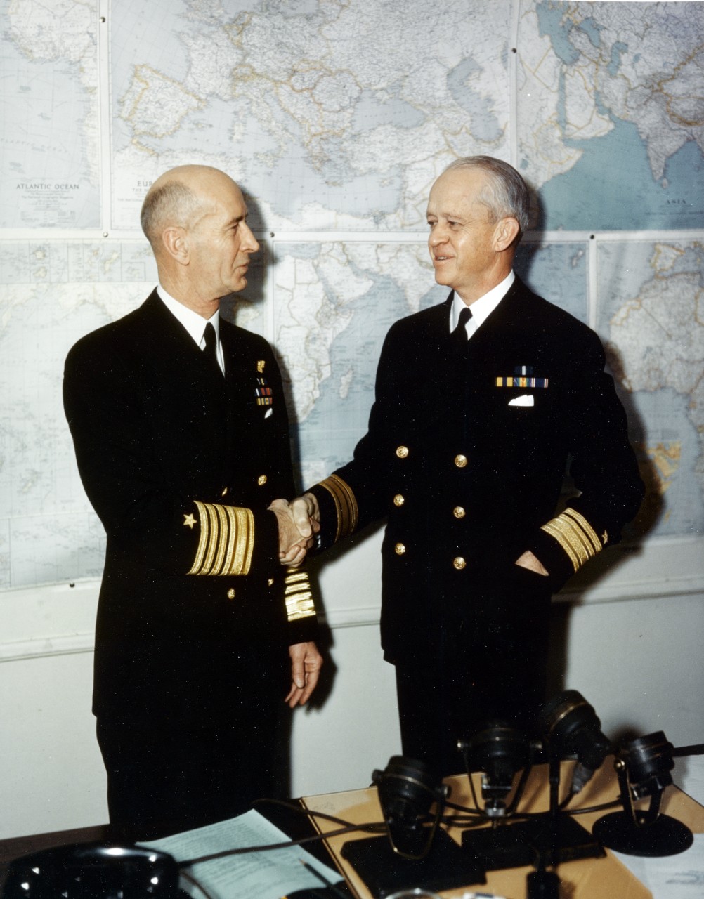 ADM Ernest J. King (left) shakes hands with RADM Russell Willson