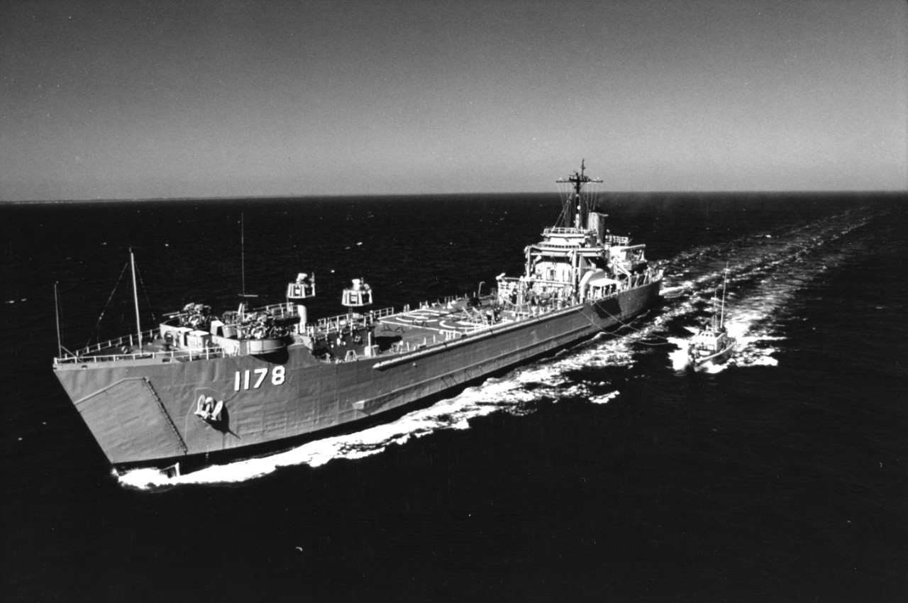 Tank landing ship USS Wood County (LST-1178) and hydrofoil patrol gunboat USS Tucumcari (PGH-2) underway during a highline operation off Cape Henry, Virginia