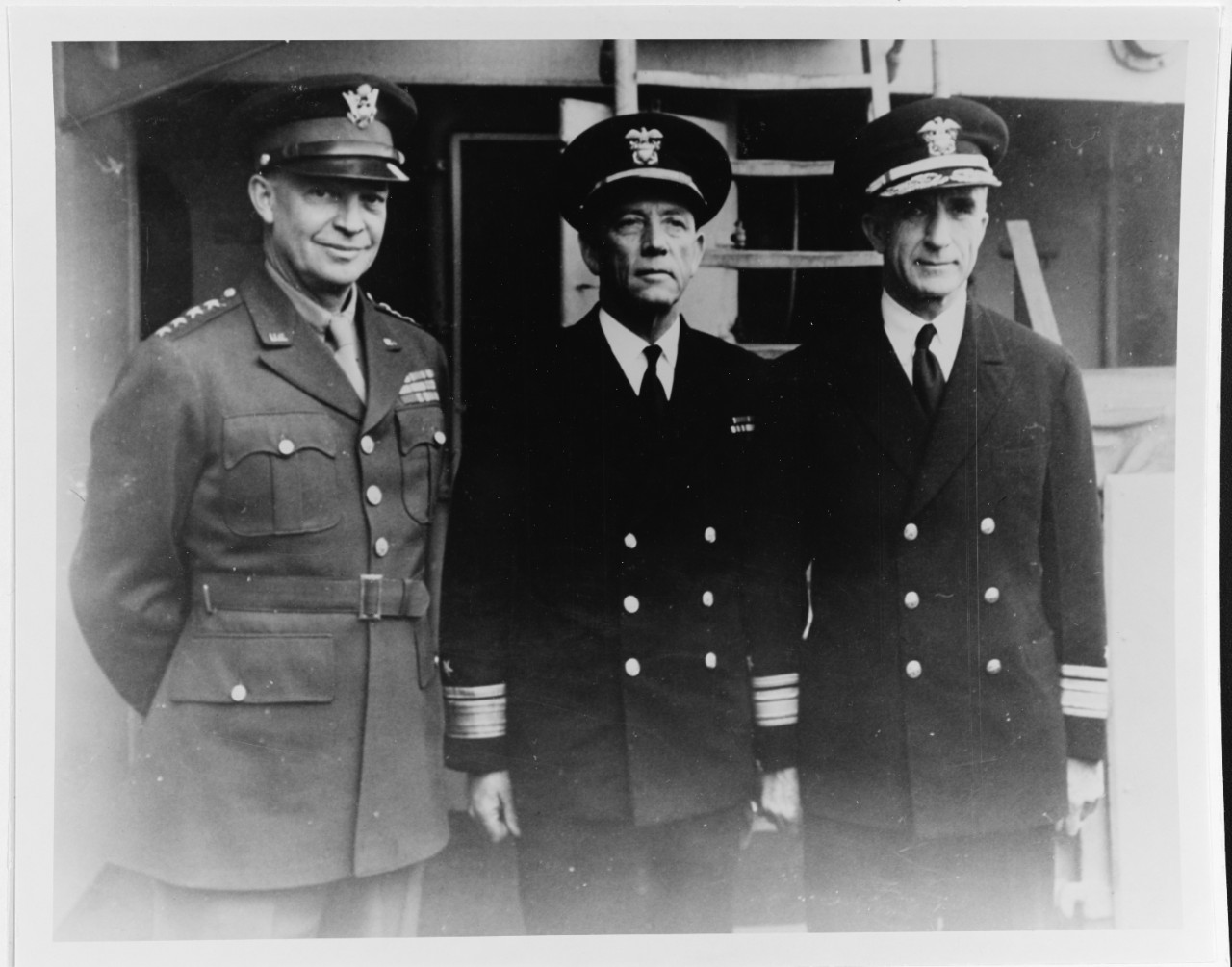 Photo #: 80-G-231642  General Dwight D. Eisenhower, U.S. Army Rear Admiral Alan G. Kirk, USN Rear Admiral Morton L. Deyo, USN