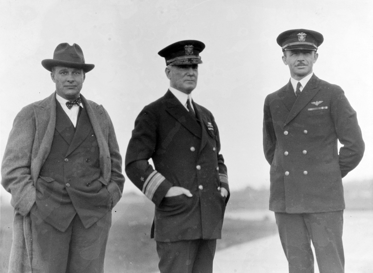 Mr. Guy Vaughn, Vice President of the Wright Aeronautical Coporation, RADM William A. Moffet, Chief of BAUER, and LCDR Homer C. Wick, C/O NAS Anacostia at Anacostia Naval Air Station, circa 1930.  