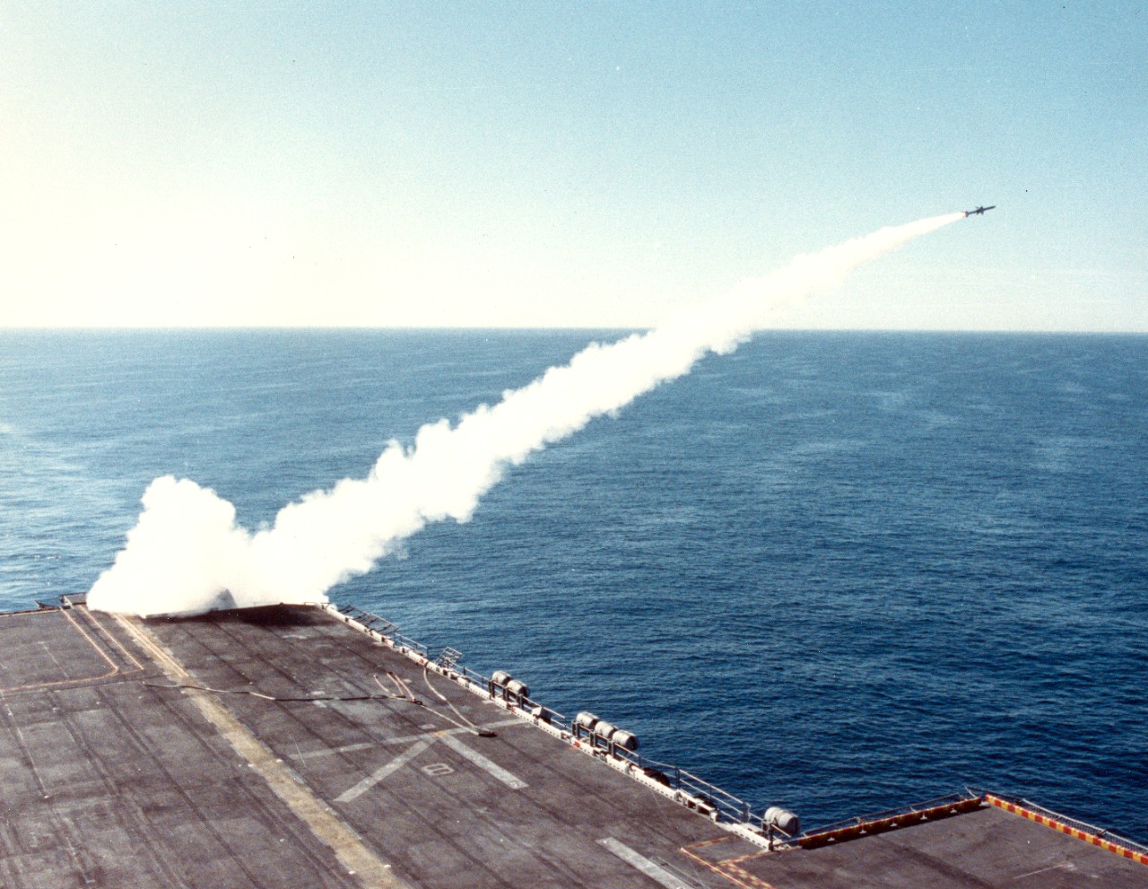Pacific Ocean - A RIM-7 Sea Sparrow missile is launched from the amphibious assault ship USS Belleau Wood (LHA-3) while underway off the coast of Southern California. December 1988. 