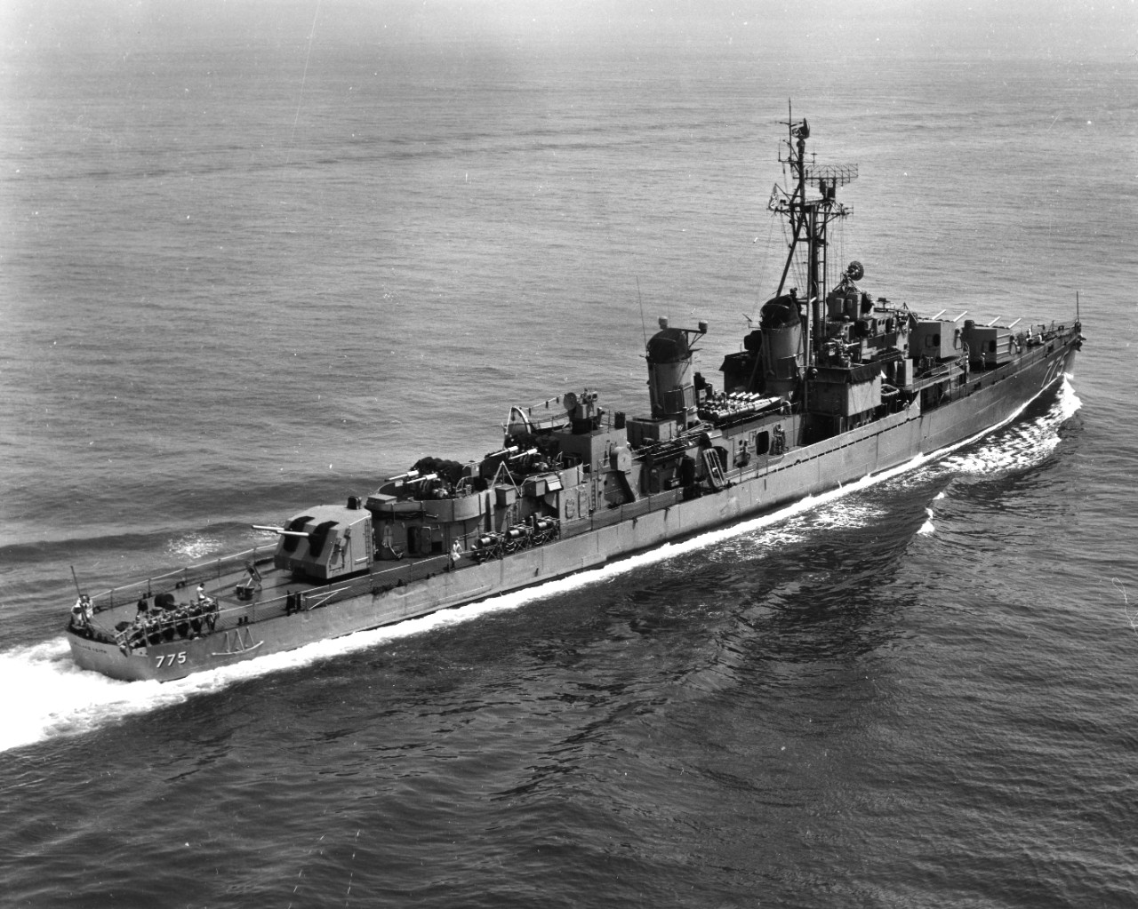 Starboard quarter view of destroyer USS Willard Keith (DD-775) underway