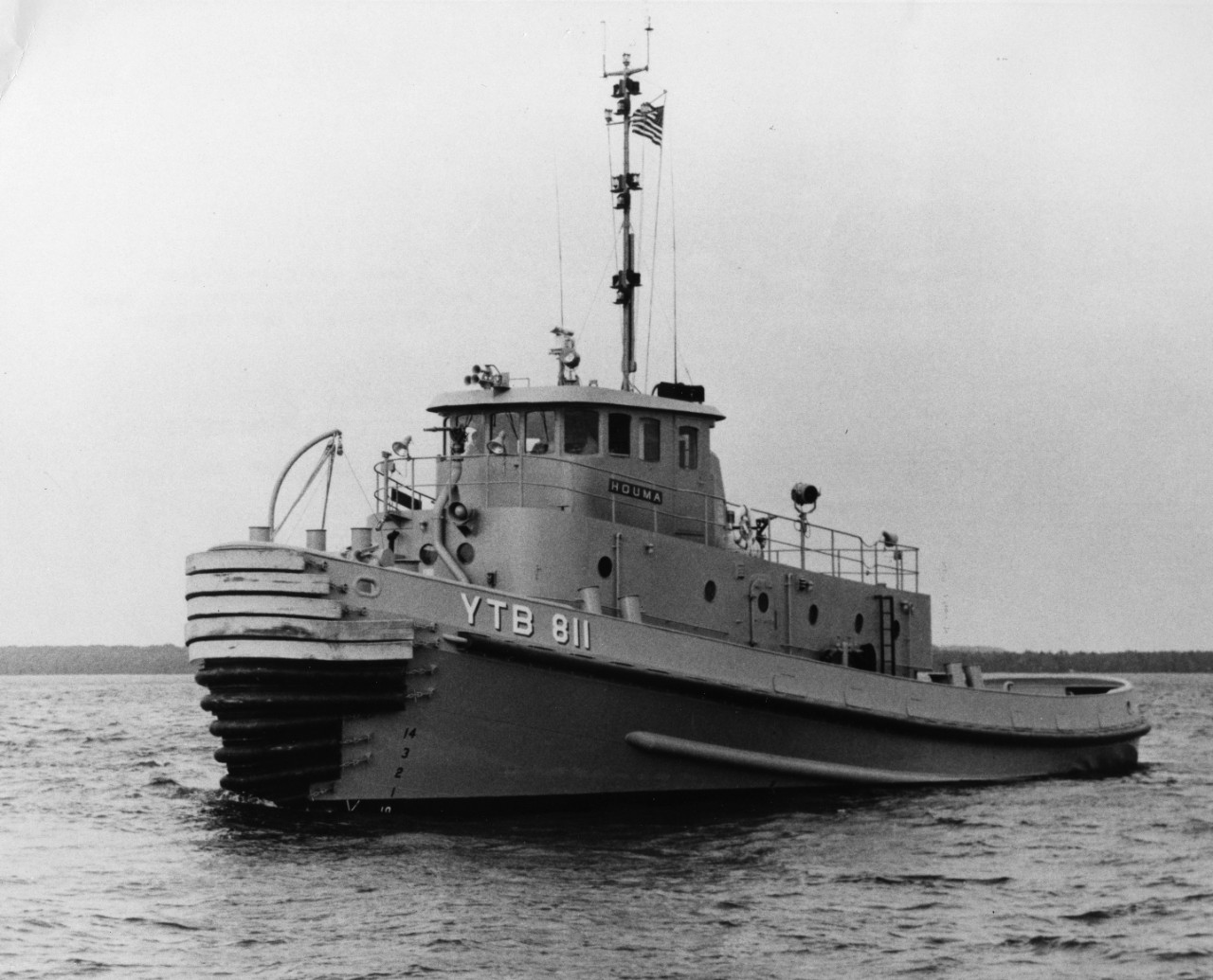 Large harbor tug USS Houma (YTB-811) underway in Sturgeon Bay, Wisconsin