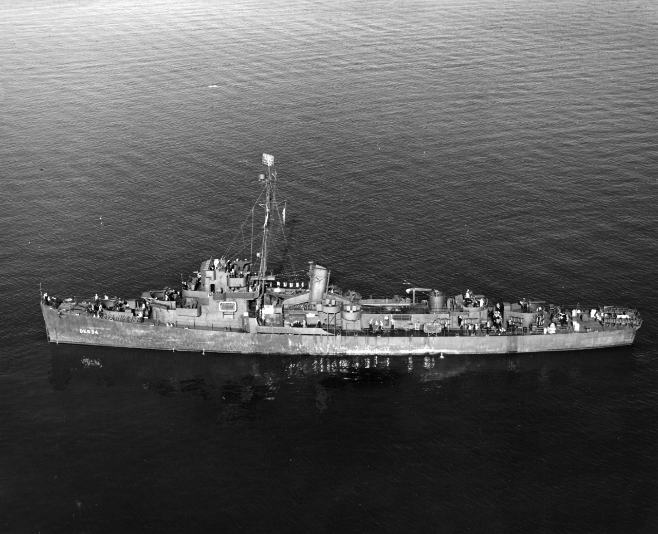 Port broadside aerial view of destroyer escort USS Whitehurst (DE-634)