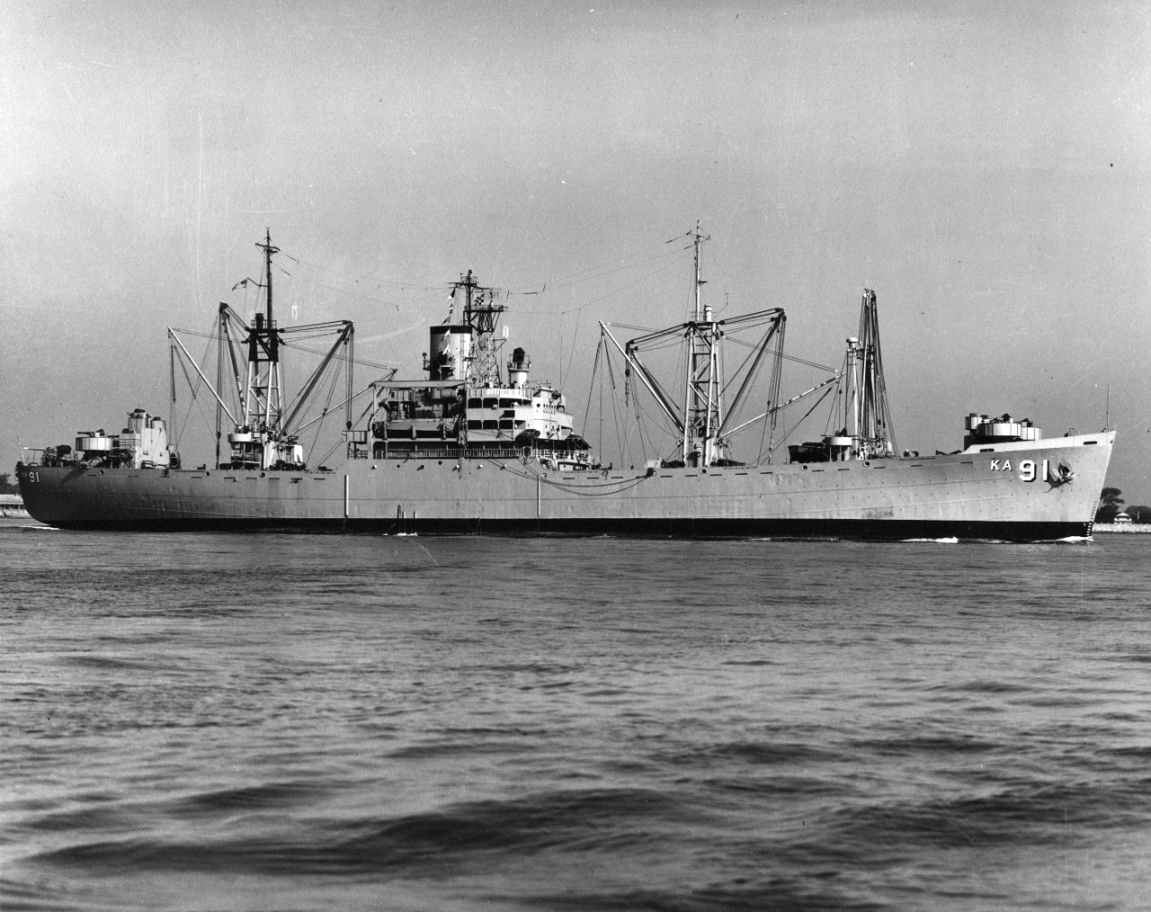 Starboard broadside view of attack cargo ship USS Whitley (AKA-91) underway at Hampton Roads, Virginia