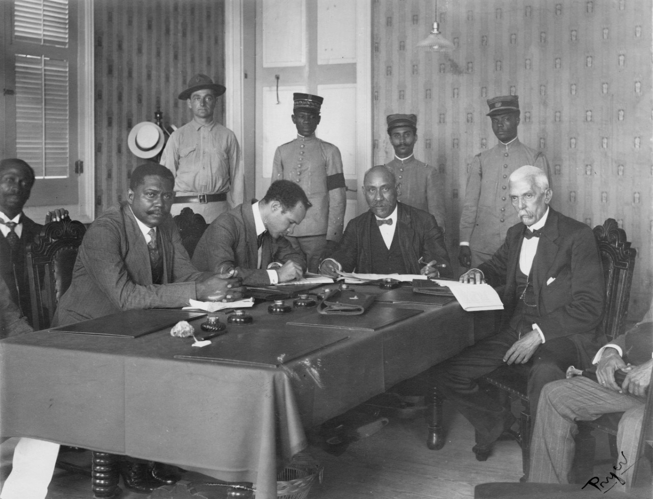 <p>NHF-038-E.17 President Dartiguenave and some of the ministers at the presidents palace November 1915, Haitian Campaign</p>

