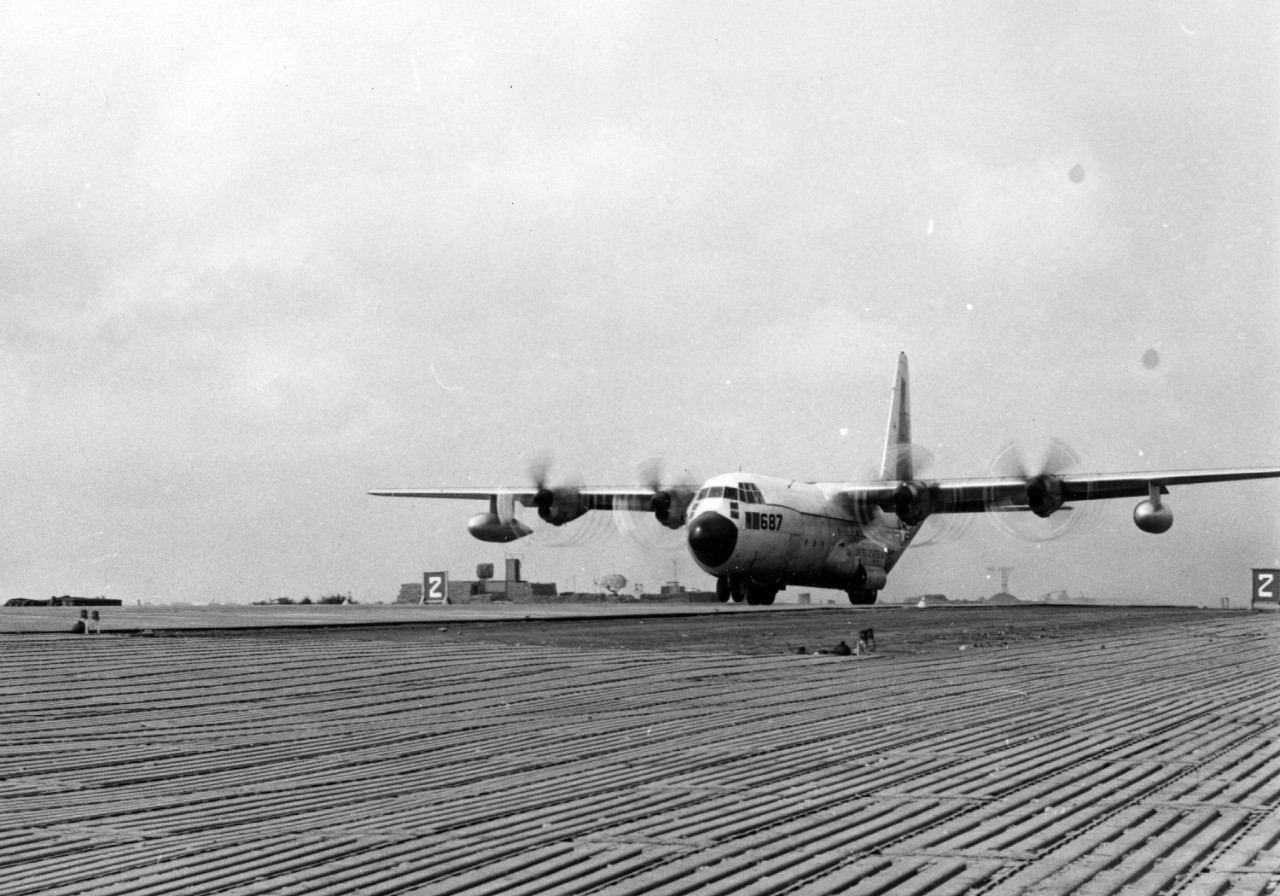 C-130 aircraft on a runway built by MCB Five at Dong Ha near the DMZ, a vital supply link and medical evacuation point. 