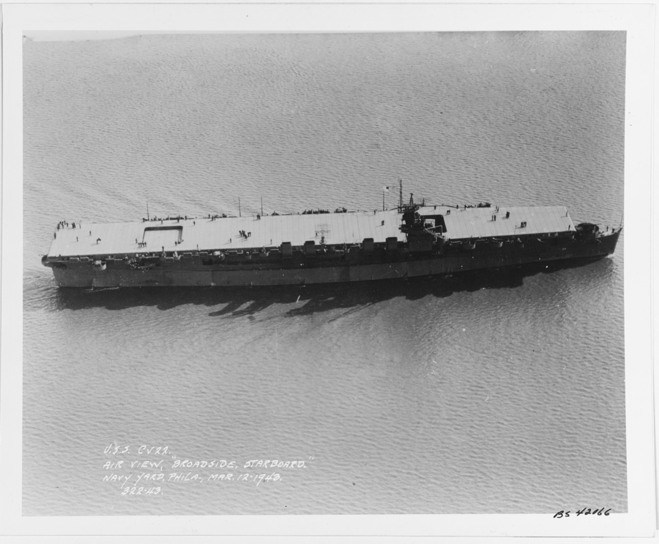 USS INDEPENDENCE (CVL-22), air view, broadside, starboard.