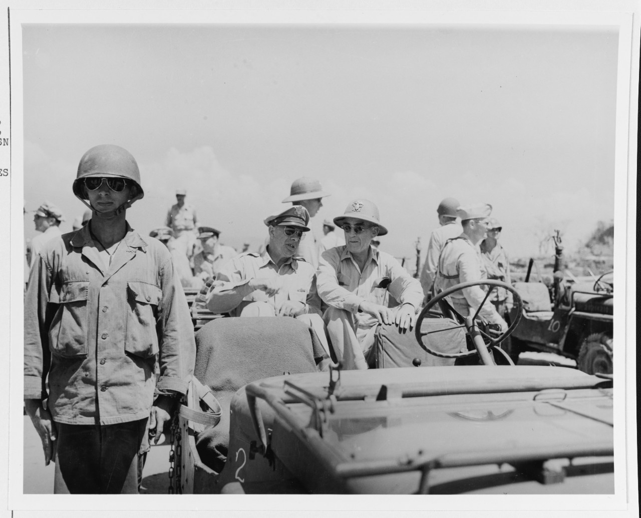 Lieutenant General George C. Kenney, USAAC; and Vice Admiral Thomas C. Kinkaid, USN.
