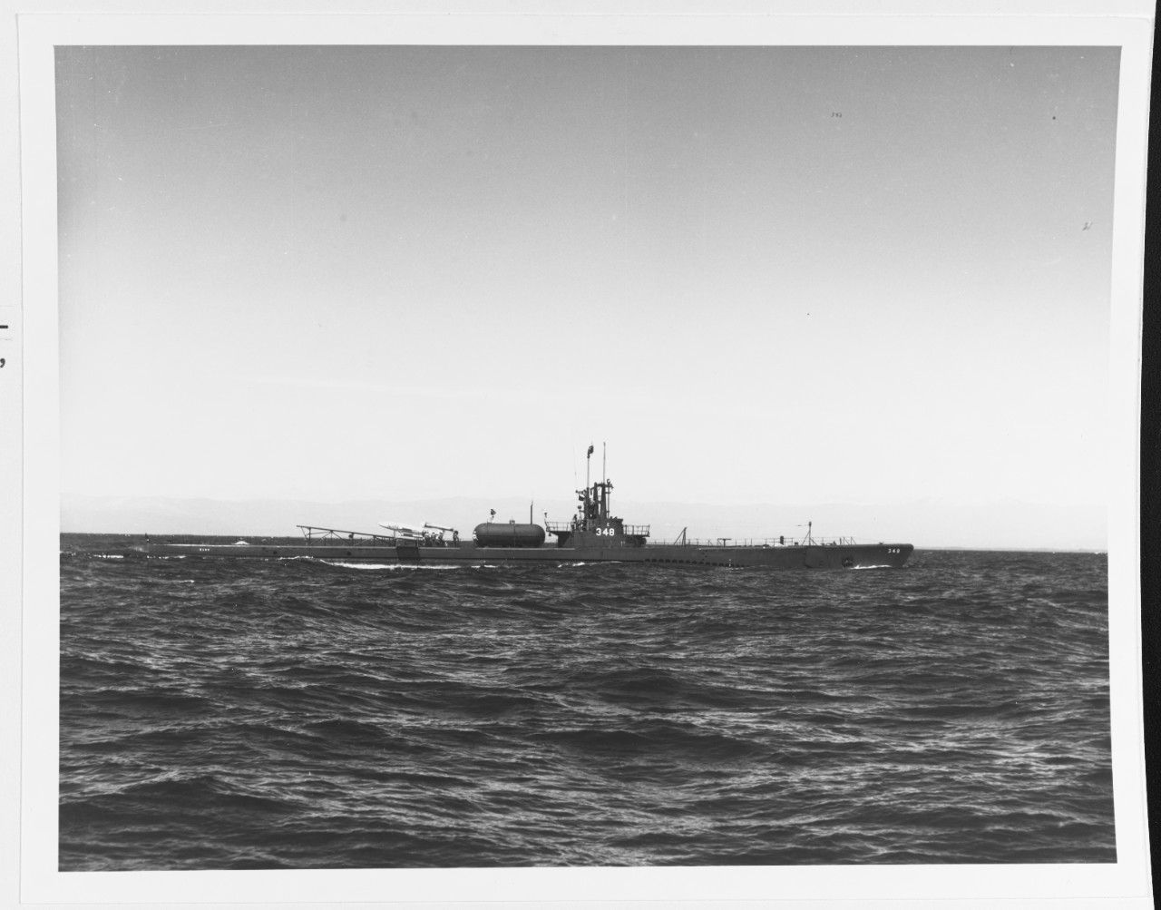 USS Cusk (SSG-348) with an LTV-N-2 Derby Loon Missile on deck while operating off Point Mugu, California, 22 March 1950.