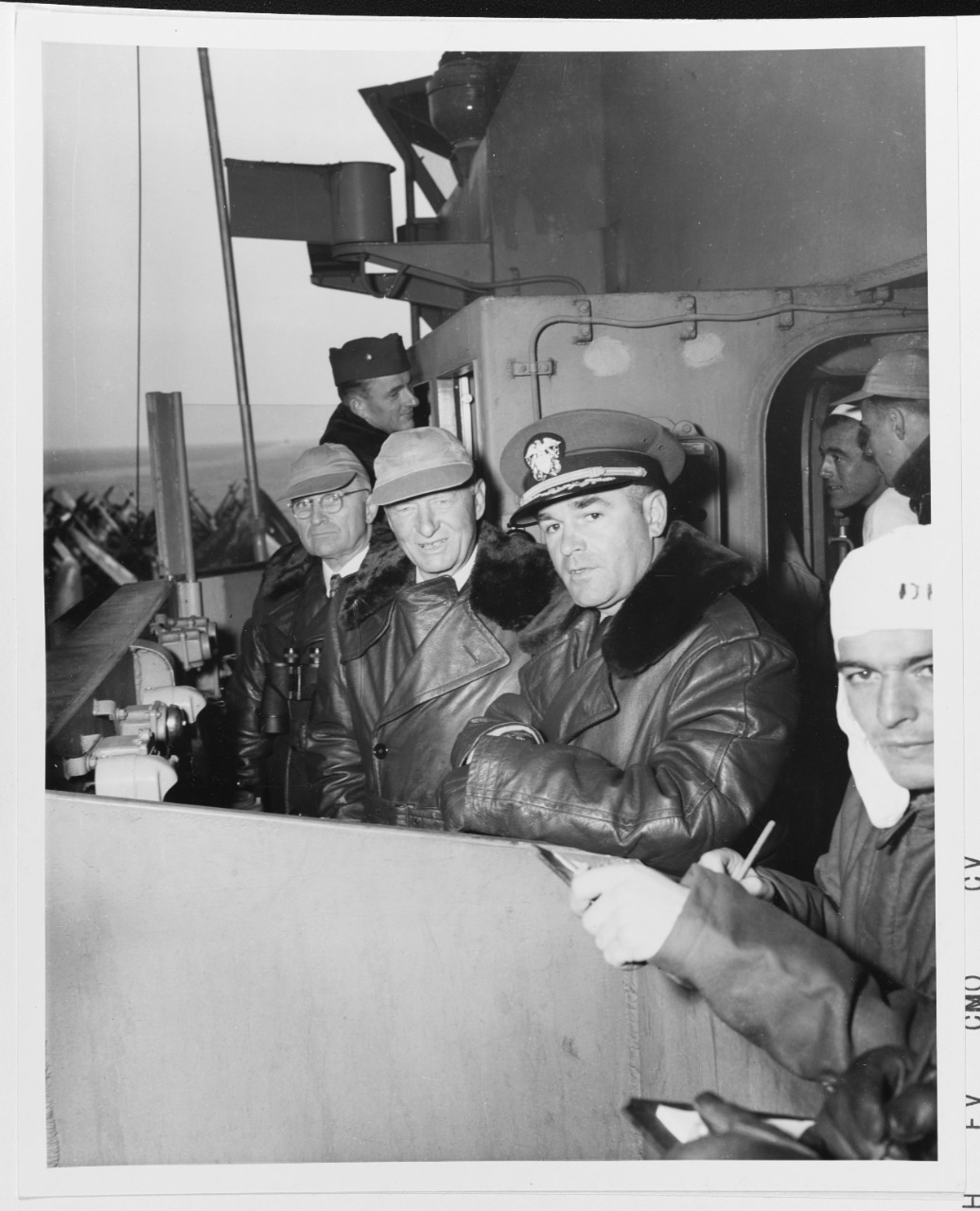 President Harry S. Truman, Fleet Admiral Chester W. Nimitz, and Commander R. C. E. Jones