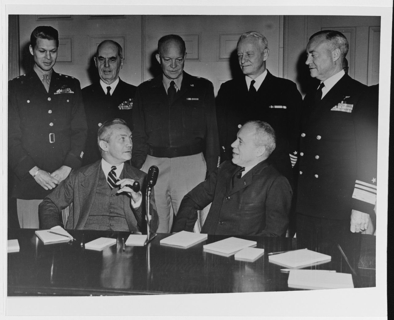 Civilian and military heads of the Army and Navy discuss the President's plan for unification, at Washington, D.C.