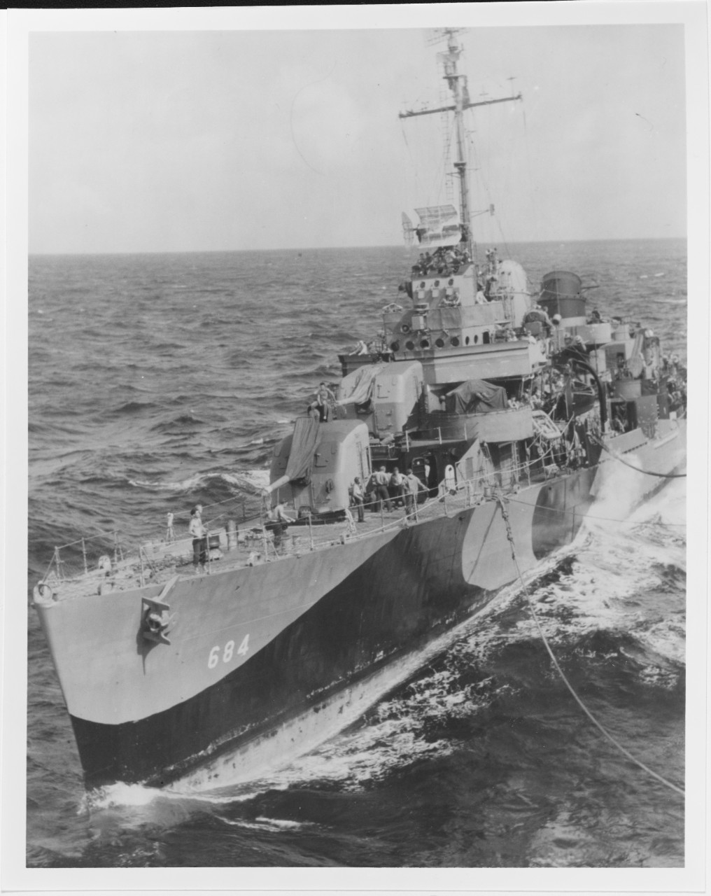 USS WEDDERBURN (DD-684) Refueling from USS INTREPID (CV-11), 18 November 1944