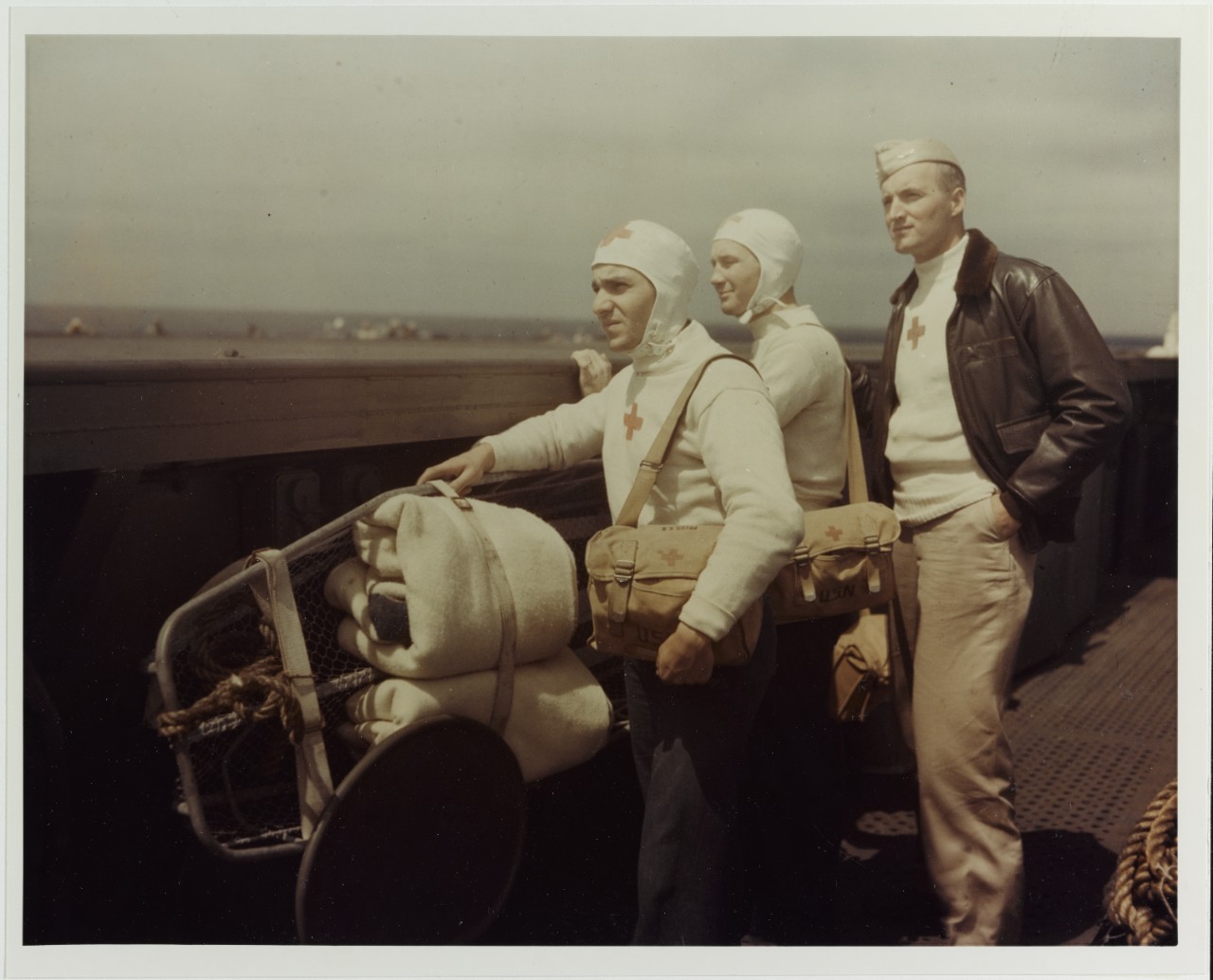 Flight Surgeon and two hospital corpsmen during World War II