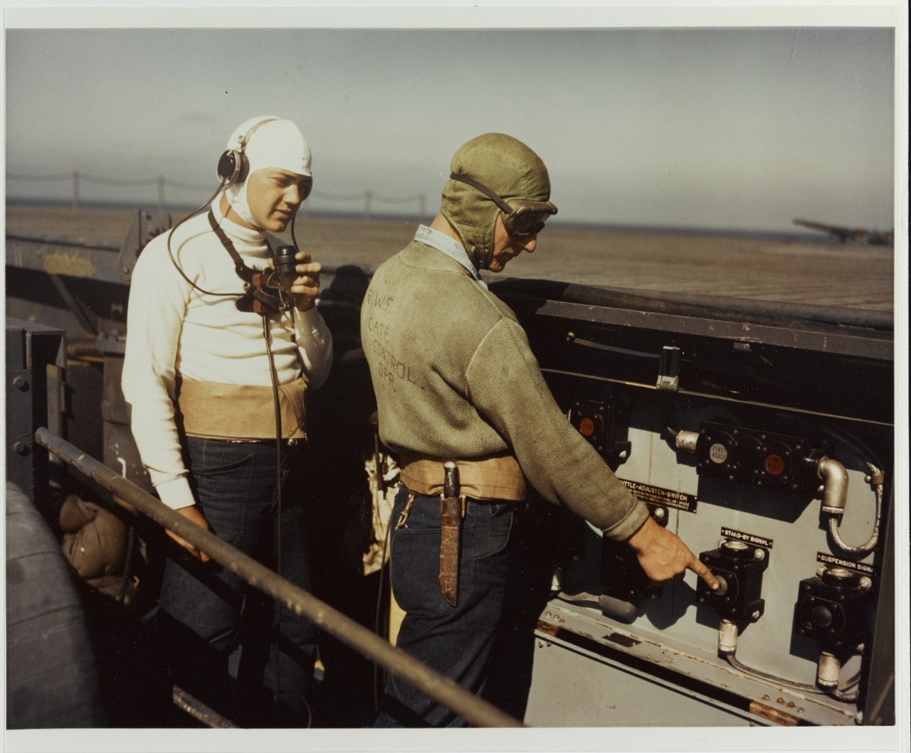 Catapult Crew Member and his Talker, circa 1943-1945