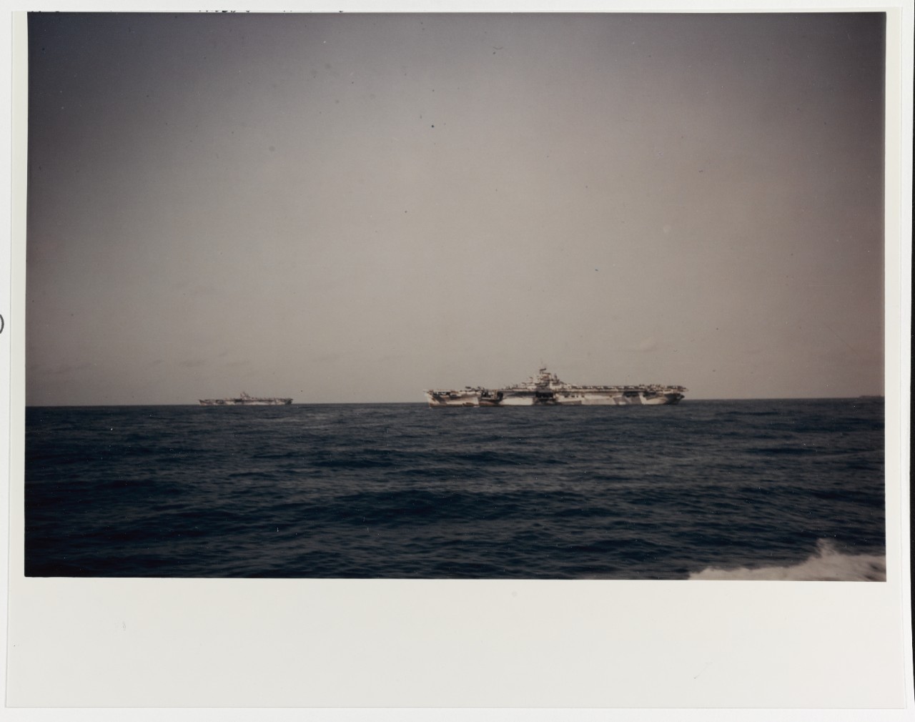 USS YORKTOWN -CV-10 in the distance-left and USS HORNET -CV-12