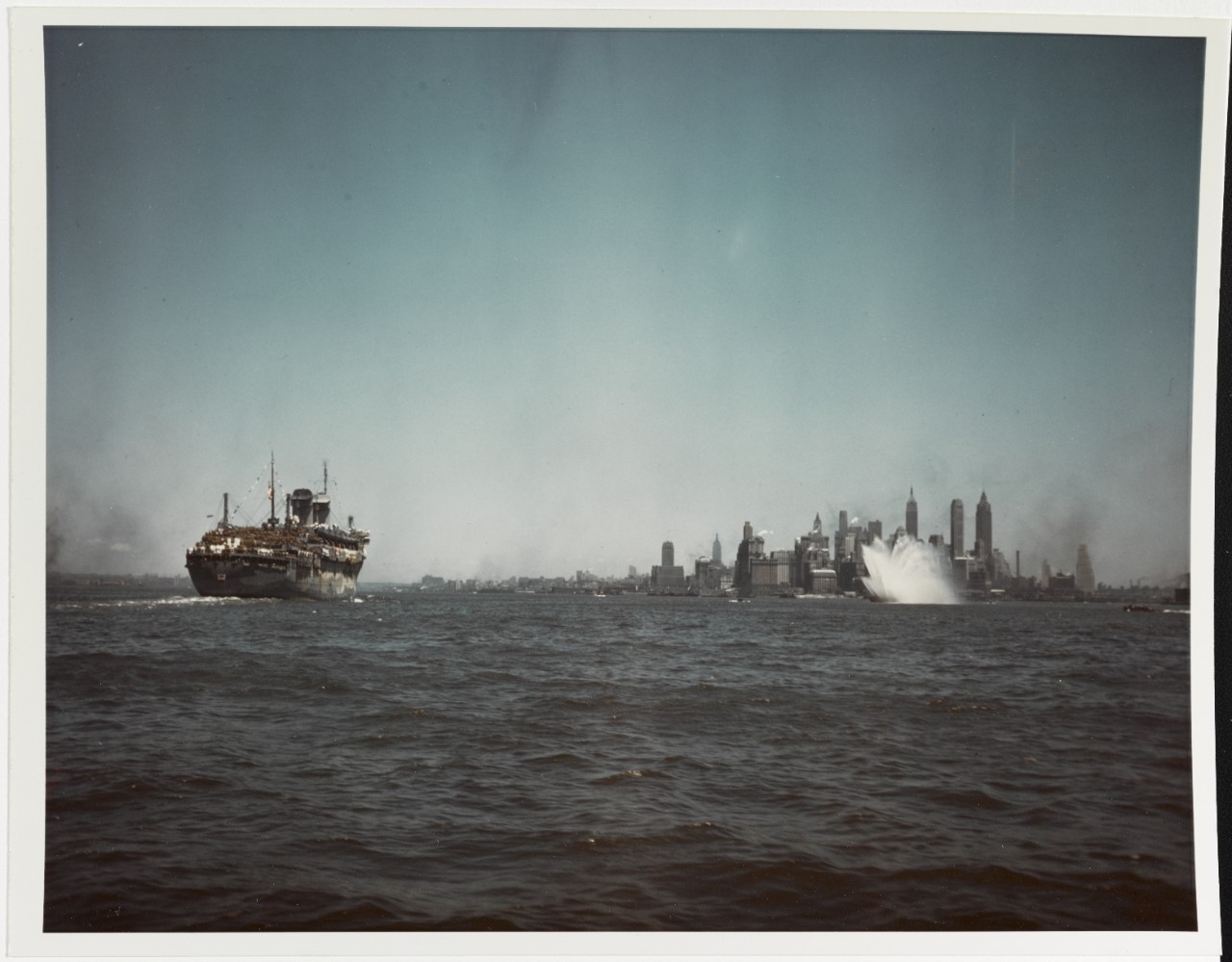 USS WEST POINT (AP-23) at New York City, bringing troops home from Europe,  11 July 1945