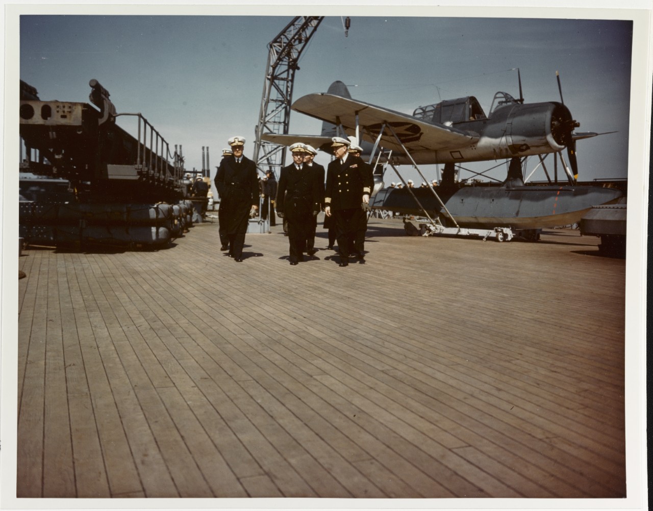 USS IOWA (BB-61) Captain John L. McCrea shows officers around ship, circa February - May 1943