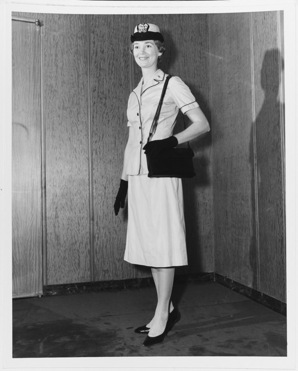Woman models Navy Nurse Corps Summer Uniform, October 9, 1961