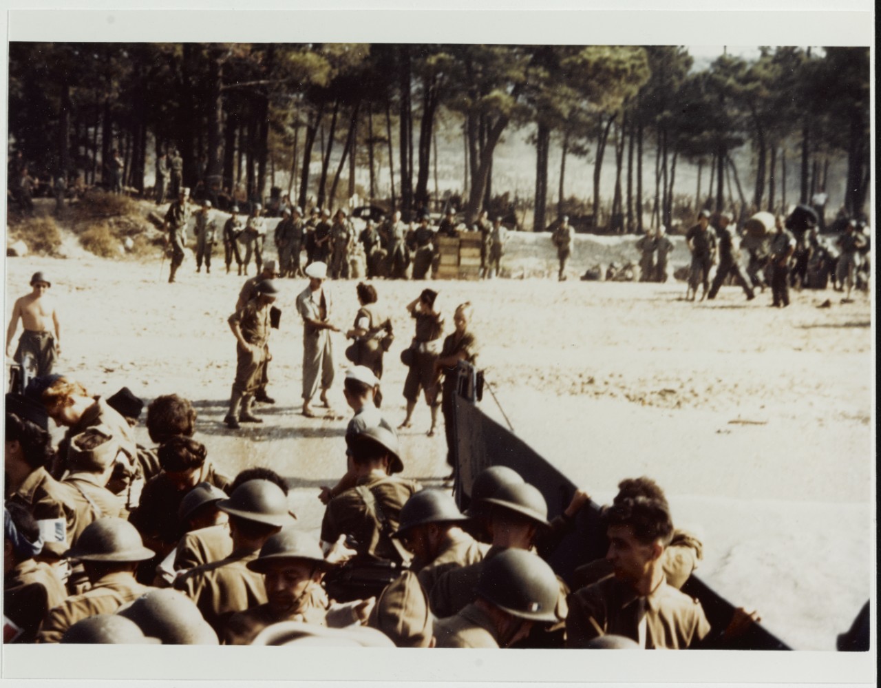 Southern France Invasion, August 1944. U.S. LCVP landing British personnel, including several women