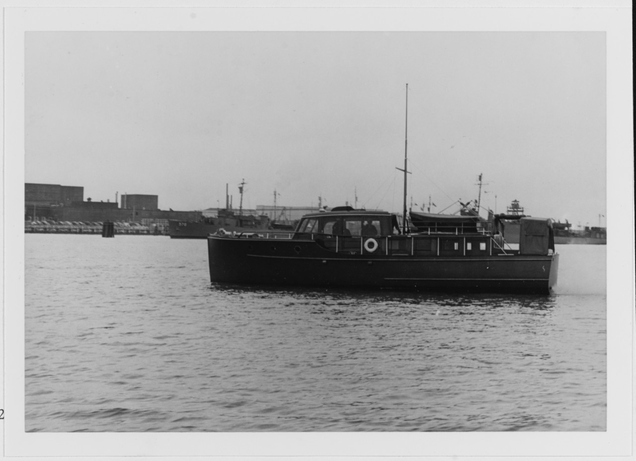Ambulance Boat YH-4 (ex-Civilian Motor Boat SEA BREEZE) circa Mid-1943. USS PC-570 in background