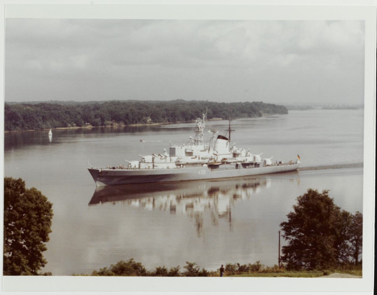 DEUTSCHLAND (German Training Ship, 1963) moving down the Potomac River following a call at Alexandria, Virginia, July 23, 1984