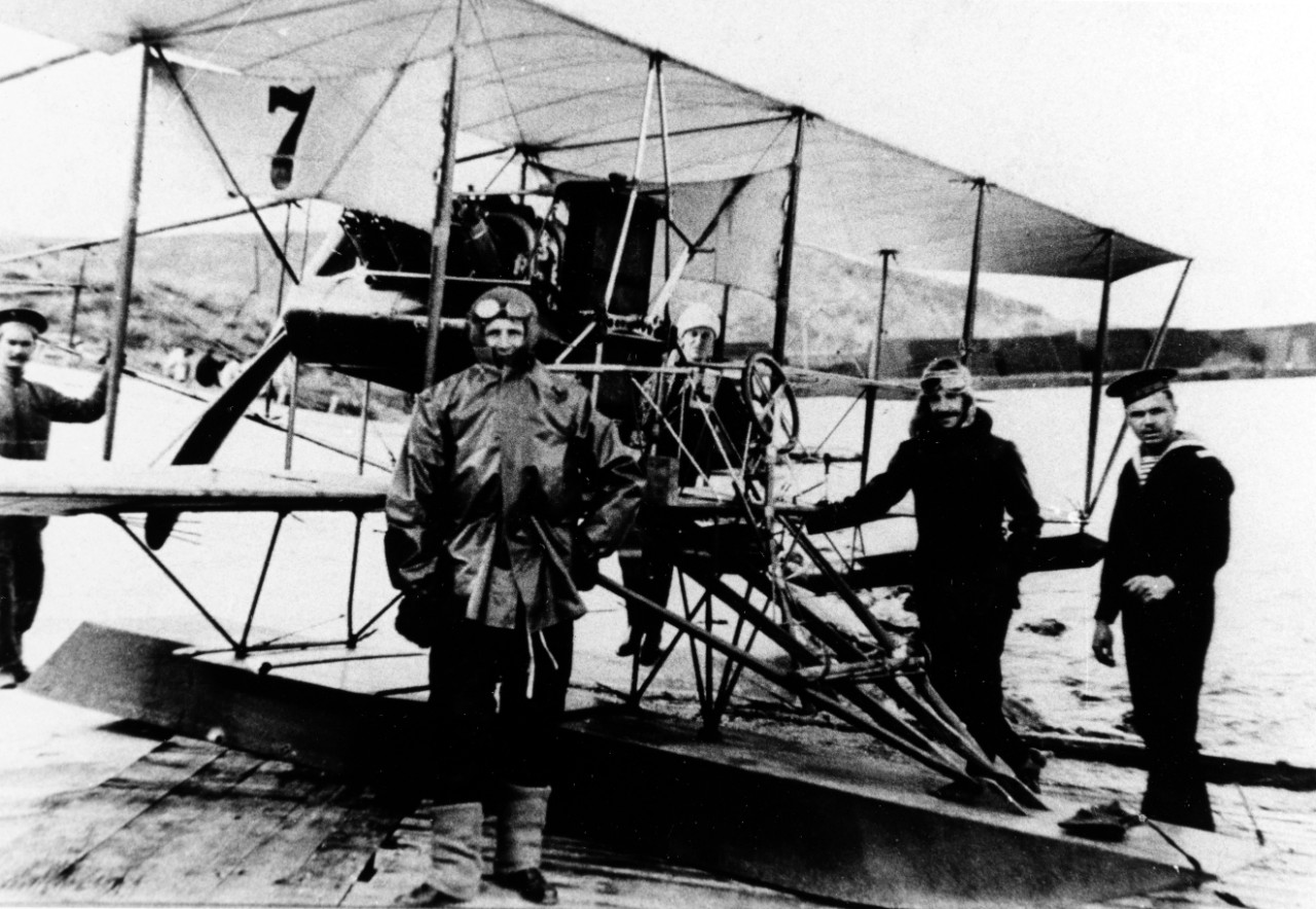Men stand with Russian Navy Curtiss Trainer Floatplane at Sevastopol in the Black Sea in about 1913