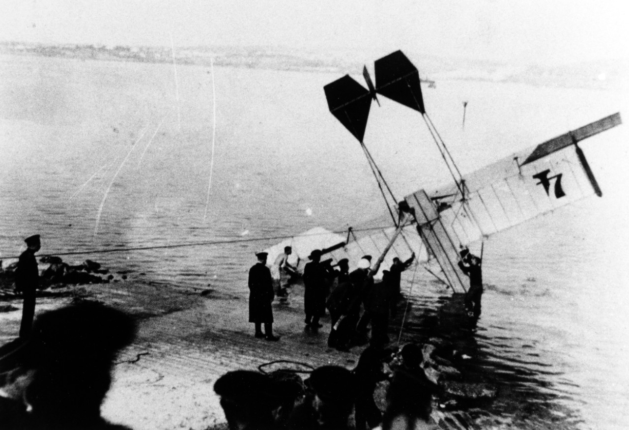 Russian Navy Curtiss Floatplane being recovered after an accident  in 1913