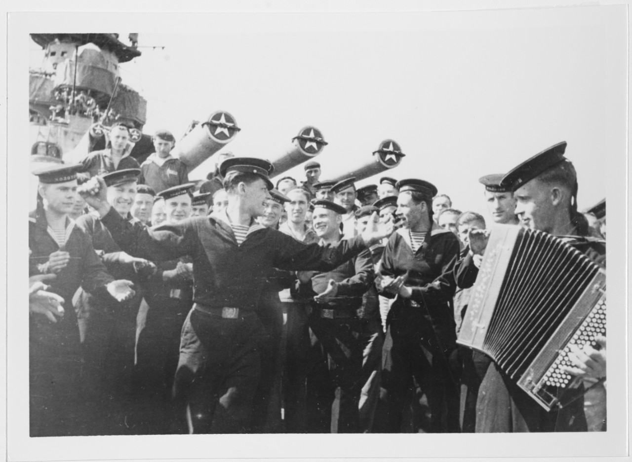 Soviet sailors enjoying some music aboard the heavy cruiser MOLOTOV in April 1943.