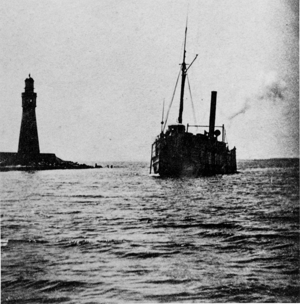 "View in Buffalo Harbor". Stereo pair photograph, showing a small Great Lakes Steamer inbound from Lake Erie, with Buffalo Breakwater Lighthouse at left, circa the 1880s