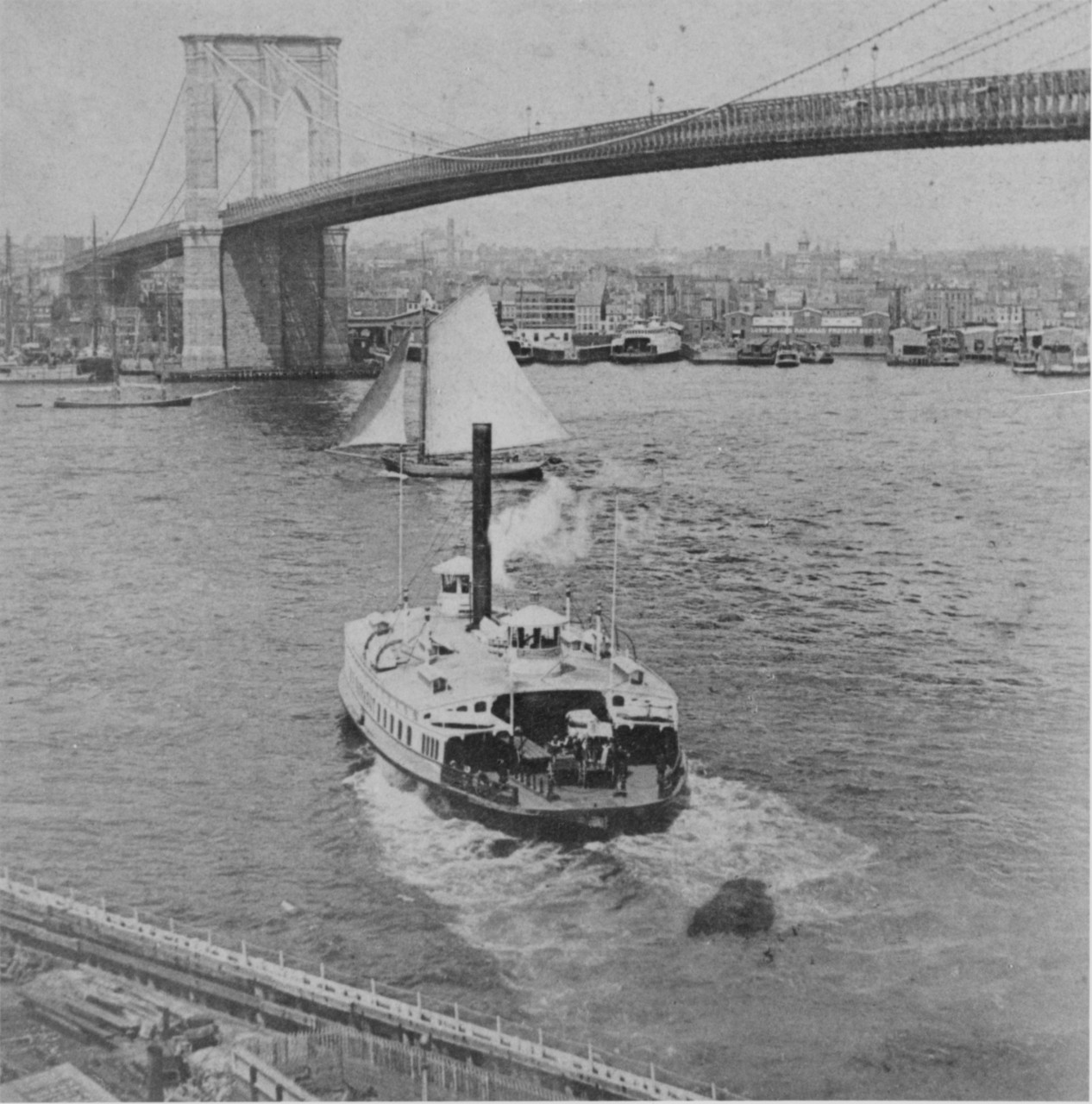 "Suspension Bridge, and New York City, From Brooklyn." View of the Brooklyn Bridge, circa the 1880s