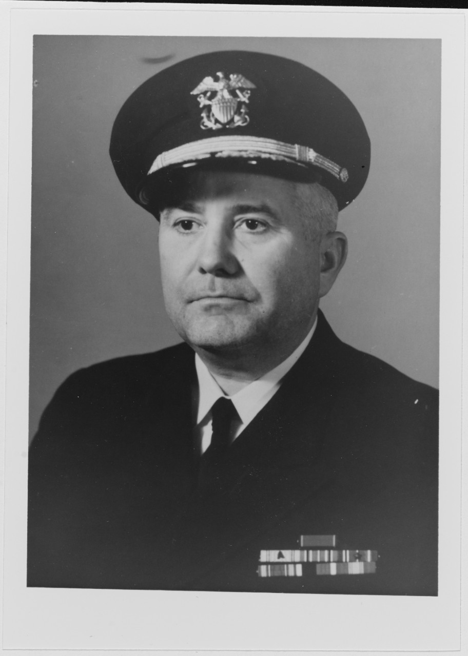 Commander John C. Henry, USNR (SC). Photograph taken on February 8, 1956