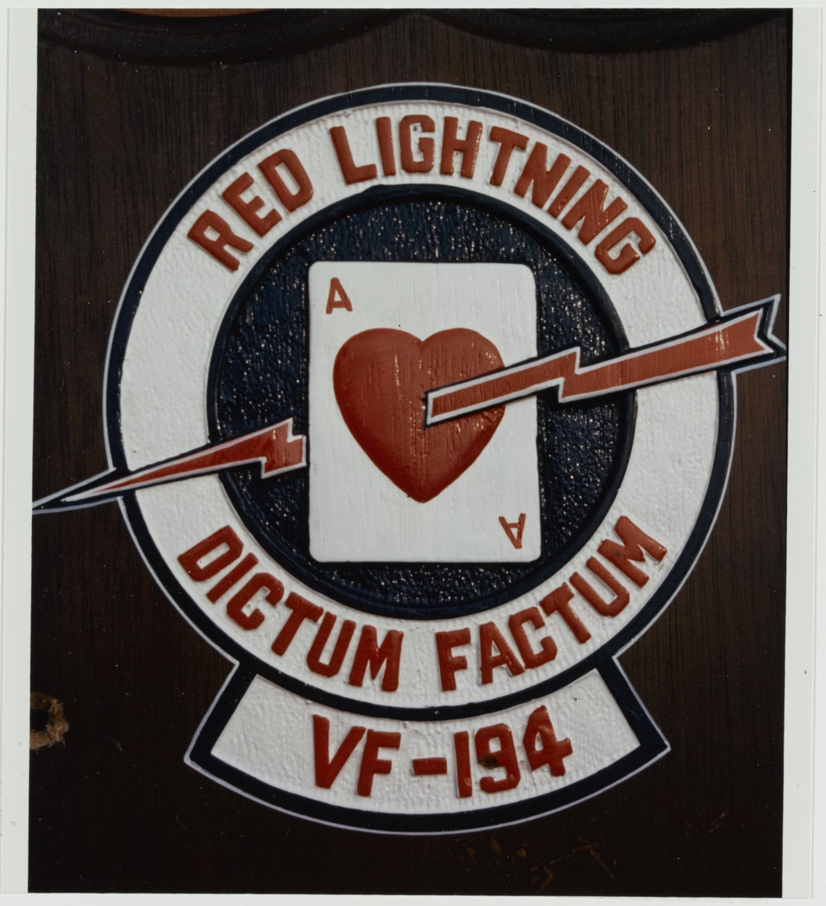 Insignia: Fighter Squadron 194 (VF-194). Red Lightning Dictum Factum VF-194