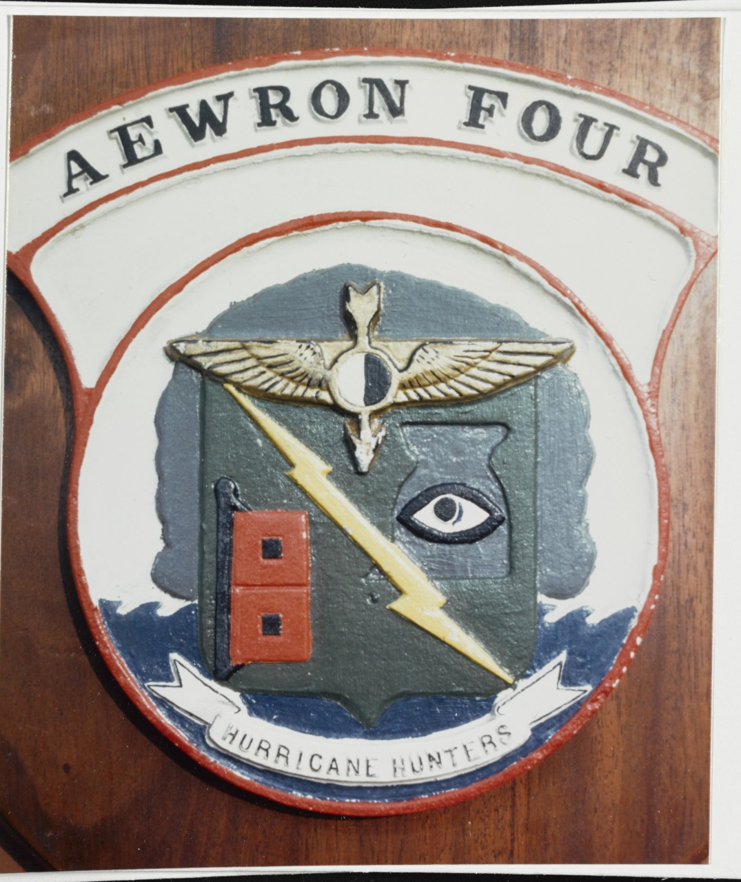 Insignia: Airborne Early Warning Squadron Four. Emblem of 1950s or 1960s vintage of the Navy's "Hurricane Hunters".