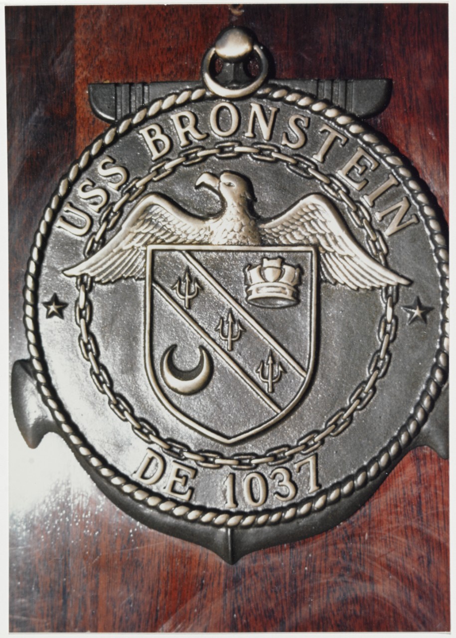 Insignia: USS BRONSTEIN (DE-1037) Emblem adopted in 1962-1963. This plaque was received in 1984.