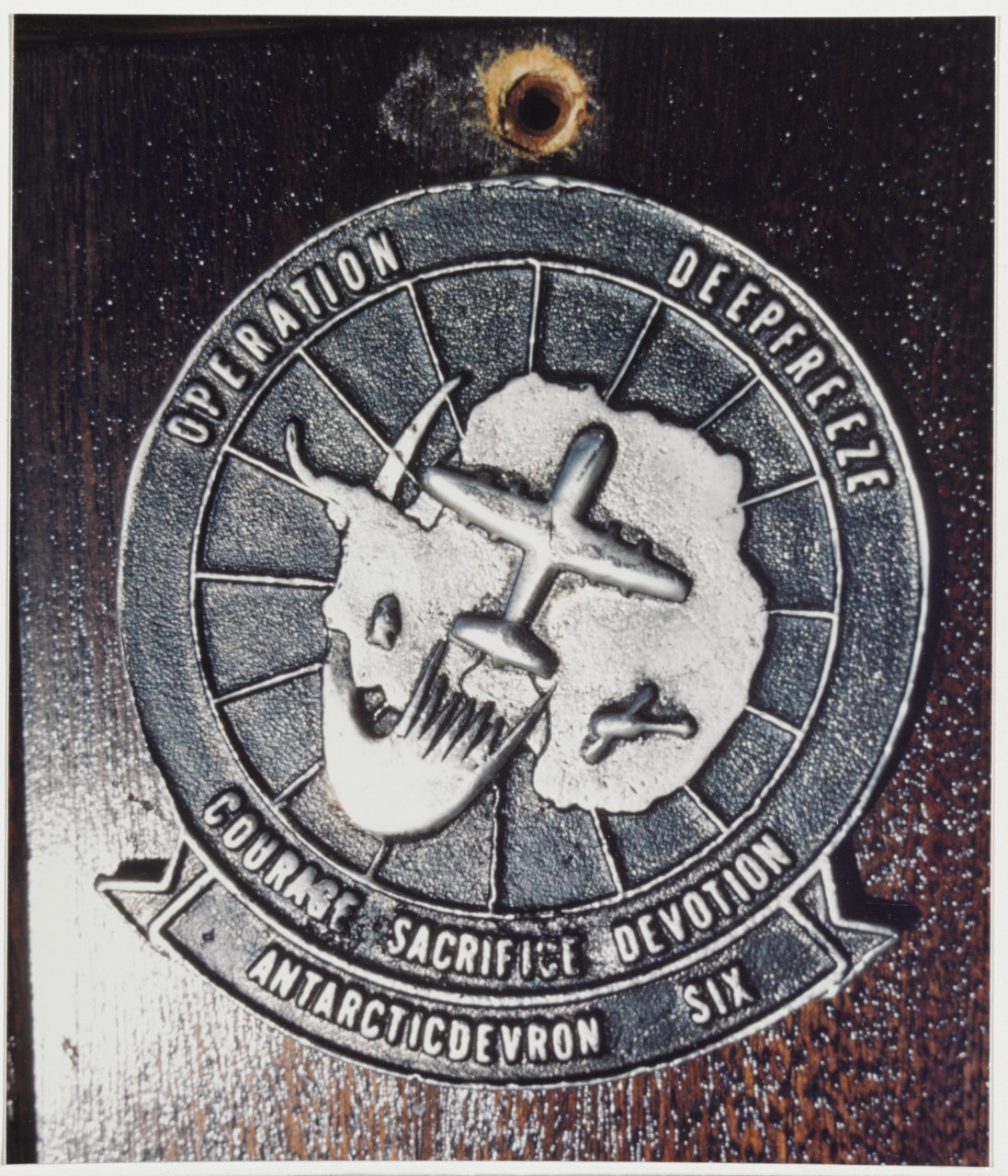 Insignia: Antarctic Development Squadron Six Emblem of the "Operation Deepfreeze" Unit, "Courage, Sacrifice, Devotion", received in 1984.